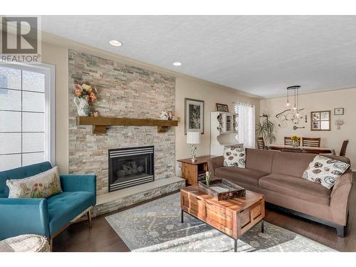 5487 Heyer Road, Prince George, BC - Indoor Photo Showing Living Room With Fireplace