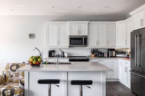 109-3075 Vint Road, Kelowna, BC - Indoor Photo Showing Kitchen With Stainless Steel Kitchen