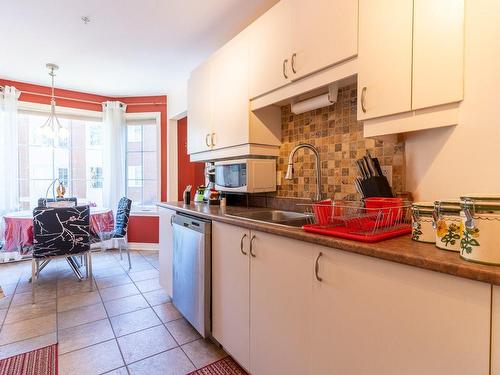 Cuisine - 202-79 Prom. Des Îles, Laval (Chomedey), QC - Indoor Photo Showing Kitchen With Double Sink