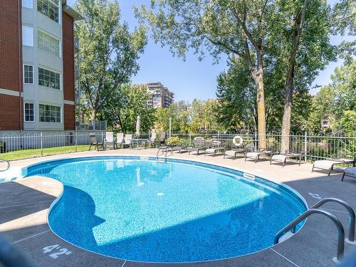 Piscine - 202-79 Prom. Des Îles, Laval (Chomedey), QC - Outdoor With In Ground Pool With Backyard