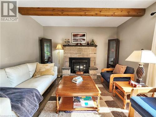 5 Noble Drive, Miller Lake, ON - Indoor Photo Showing Living Room With Fireplace