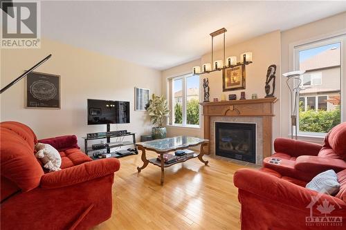 1817 Mickelberry Crescent, Ottawa, ON - Indoor Photo Showing Living Room With Fireplace