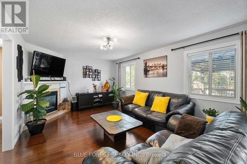 2982 Devon Road, London, ON - Indoor Photo Showing Living Room With Fireplace