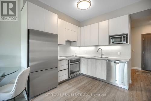 311 - 15 Water Walk Drive, Markham (Unionville), ON - Indoor Photo Showing Kitchen With Stainless Steel Kitchen