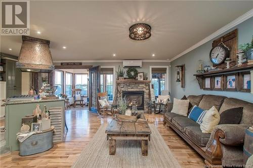 180 Leblanc Avenue, Shediac, NB - Indoor Photo Showing Living Room With Fireplace