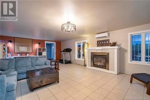 180 Leblanc Avenue, Shediac, NB - Indoor Photo Showing Living Room With Fireplace