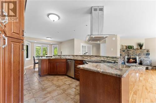 40 Blue Danube Way, Pembroke, ON - Indoor Photo Showing Kitchen With Fireplace