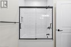 Main bathroom - tub with tiled shower - 