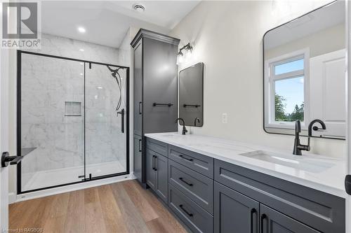 Primary ensuite - walk-in custom tiled shower & double vanity - 31 Mercedes Crescent, Kincardine, ON - Indoor Photo Showing Bathroom