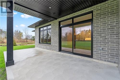 Enlarged patio doors to covered porch - 31 Mercedes Crescent, Kincardine, ON - Outdoor With Deck Patio Veranda With Exterior