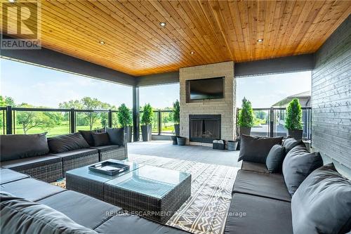 3331 Homestead Drive, Hamilton (Mount Hope), ON -  Photo Showing Living Room With Fireplace