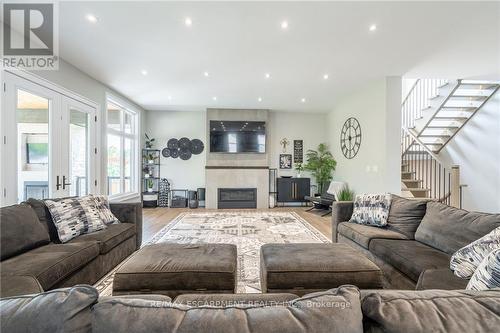 3331 Homestead Drive, Hamilton (Mount Hope), ON - Indoor Photo Showing Living Room With Fireplace