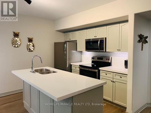 2030-31 - 90 Highland Drive, Oro-Medonte (Horseshoe Valley), ON - Indoor Photo Showing Kitchen With Double Sink