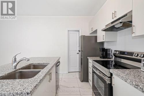 74 Nicort Road, Wasaga Beach, ON - Indoor Photo Showing Kitchen With Double Sink