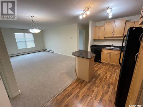 318 326 Herold Road, Saskatoon, SK - Indoor Photo Showing Kitchen With Double Sink