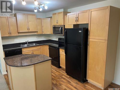 318 326 Herold Road, Saskatoon, SK - Indoor Photo Showing Kitchen With Double Sink