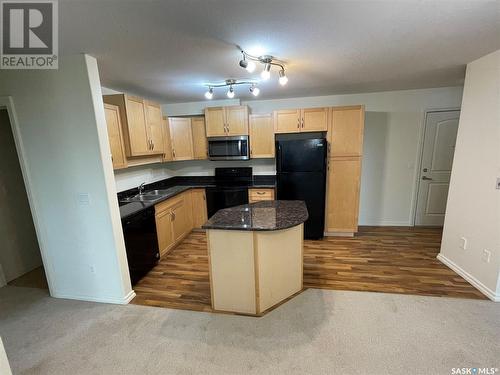 318 326 Herold Road, Saskatoon, SK - Indoor Photo Showing Kitchen With Double Sink