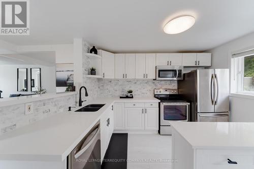 39 Division Street, Hamilton (Homeside), ON - Indoor Photo Showing Kitchen With Double Sink