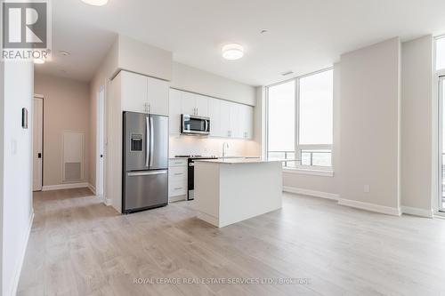 2205 - 3220 William Coltson Avenue, Oakville, ON - Indoor Photo Showing Kitchen With Stainless Steel Kitchen