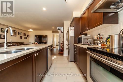 25 Patterson Drive, Haldimand, ON - Indoor Photo Showing Kitchen With Double Sink