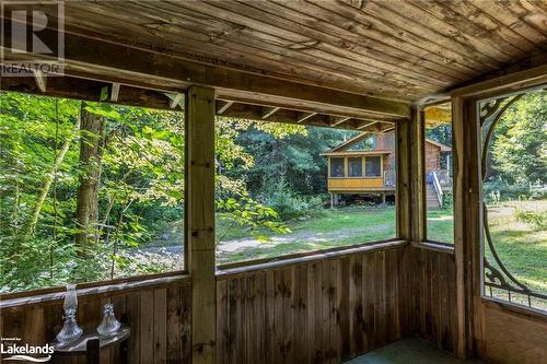 Looking up to cabin - 1880 Boldts Lane, Minden Hills, ON - Outdoor With Deck Patio Veranda With Exterior