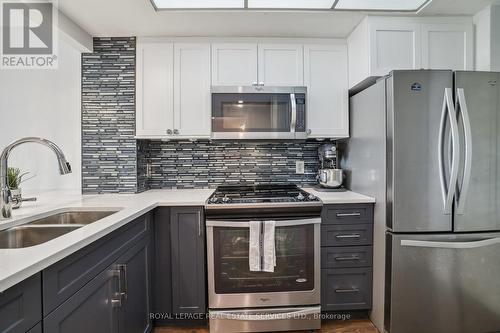 309 - 415 Locust Street, Burlington (Brant), ON - Indoor Photo Showing Kitchen With Stainless Steel Kitchen With Double Sink With Upgraded Kitchen