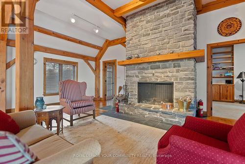 4039 County Rd 13 Road N, Prince Edward County, ON - Indoor Photo Showing Living Room With Fireplace