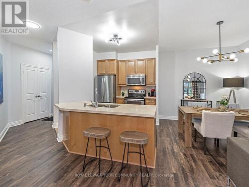 114 - 25 Earlington Avenue, Toronto (Kingsway South), ON - Indoor Photo Showing Kitchen With Stainless Steel Kitchen With Double Sink With Upgraded Kitchen