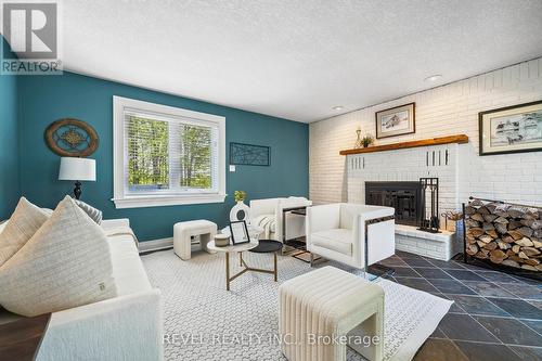 11485 First Line, Milton (Nassagaweya), ON - Indoor Photo Showing Living Room With Fireplace