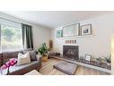 4 103Rd Avenue, Kimberley, BC  - Indoor Photo Showing Living Room With Fireplace 