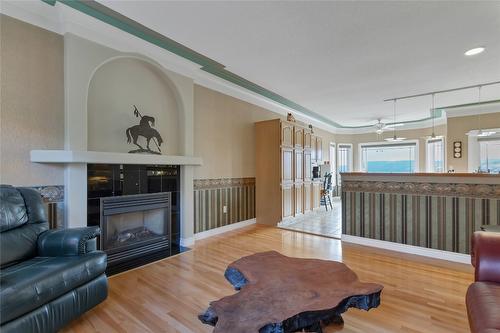 633 Middleton Way, Coldstream, BC - Indoor Photo Showing Living Room With Fireplace