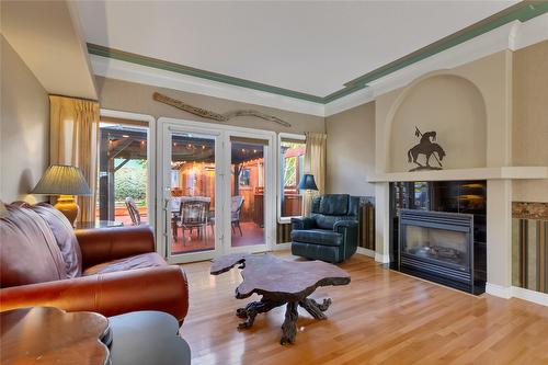 633 Middleton Way, Coldstream, BC - Indoor Photo Showing Living Room With Fireplace