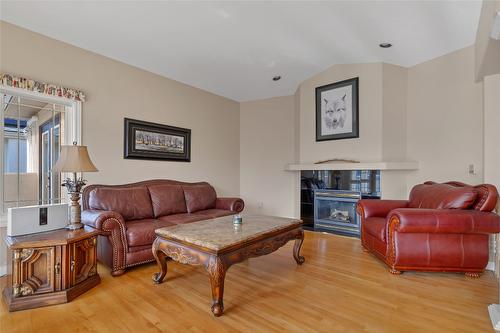 633 Middleton Way, Coldstream, BC - Indoor Photo Showing Living Room With Fireplace