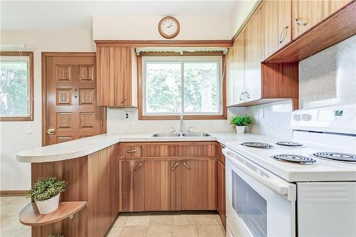 69 Orphir Road, Hamilton, ON - Indoor Photo Showing Kitchen With Double Sink