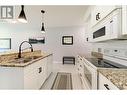 2523 Shannon View Drive Unit# 106, West Kelowna, BC  - Indoor Photo Showing Kitchen With Double Sink 