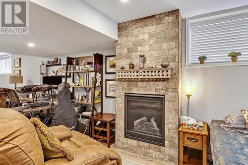 25 Brinton Drive, Peterborough (Otonabee), ON - Indoor Photo Showing Living Room With Fireplace