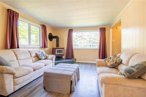 428 Epsilon Avenue, Winnipeg Beach, MB - Indoor Photo Showing Living Room With Fireplace