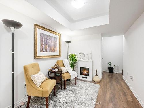 10-1125 Legar Way, Milton, ON - Indoor Photo Showing Other Room With Fireplace