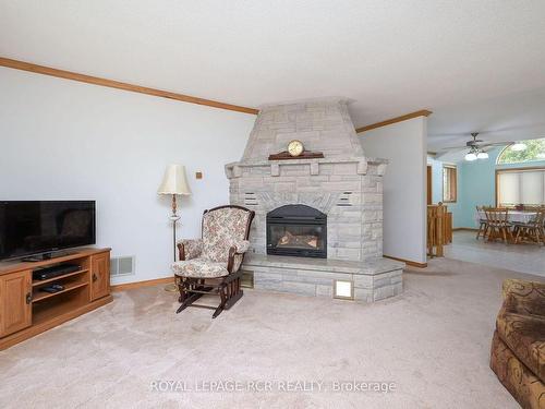 245 Penetanguishene Rd N, Oro-Medonte, ON - Indoor Photo Showing Living Room With Fireplace