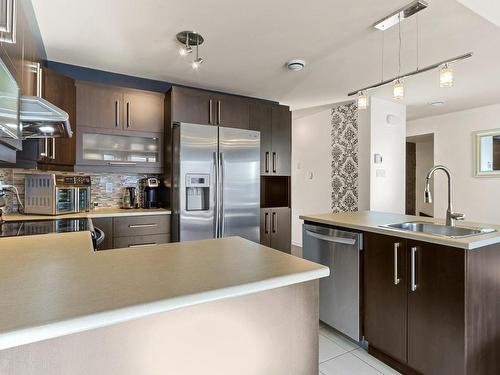 Cuisine - 5-7130 Rue Du Chardonneret, Brossard, QC - Indoor Photo Showing Kitchen With Double Sink With Upgraded Kitchen