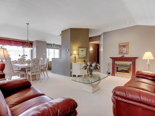 Living room - 6-674 Rue Jean-Deslauriers, Boucherville, QC - Indoor Photo Showing Living Room With Fireplace