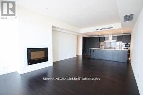 4208 - 180 University Avenue E, Toronto, ON - Indoor Photo Showing Living Room With Fireplace