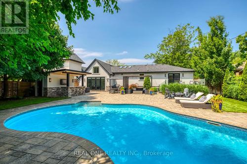 1386 Willowdown Road, Oakville, ON - Outdoor With In Ground Pool With Deck Patio Veranda With Backyard