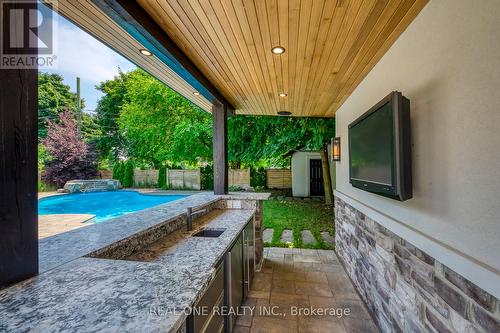 1386 Willowdown Road, Oakville, ON - Outdoor With In Ground Pool With Deck Patio Veranda