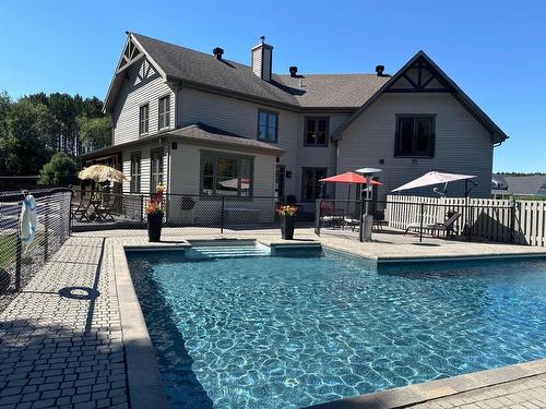 Face arriÃ¨re - 19 Av. Des Buses, Saint-Sauveur, QC - Outdoor With In Ground Pool With Deck Patio Veranda