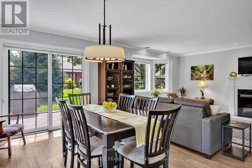 10 - 684 Whitaker Street, Peterborough (Ashburnham), ON - Indoor Photo Showing Dining Room With Fireplace