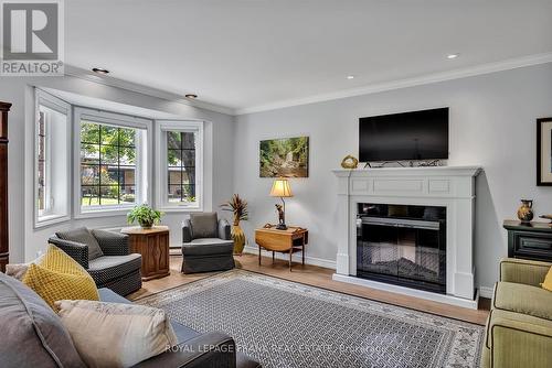 10 - 684 Whitaker Street, Peterborough (Ashburnham), ON - Indoor Photo Showing Living Room With Fireplace