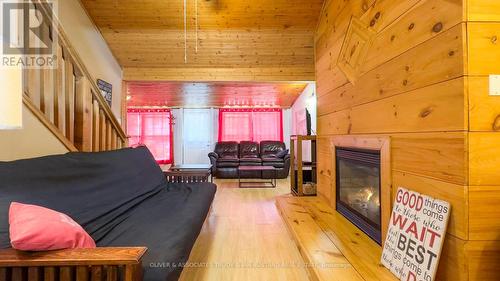 21 Huron Street, Lambton Shores (Grand Bend), ON - Indoor With Fireplace