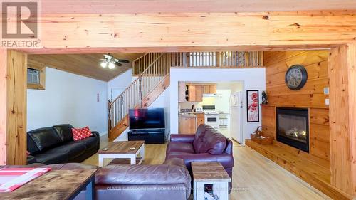 21 Huron Street, Lambton Shores (Grand Bend), ON - Indoor Photo Showing Living Room With Fireplace