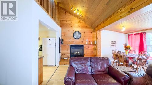 21 Huron Street, Lambton Shores (Grand Bend), ON - Indoor Photo Showing Living Room With Fireplace